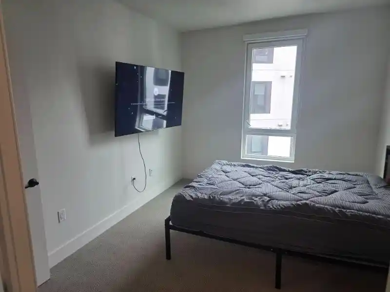 Mattress in an apartment bedroom before removal